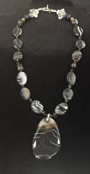 Banded Agate Pendant and Smoky Quartz Grounded Amulet